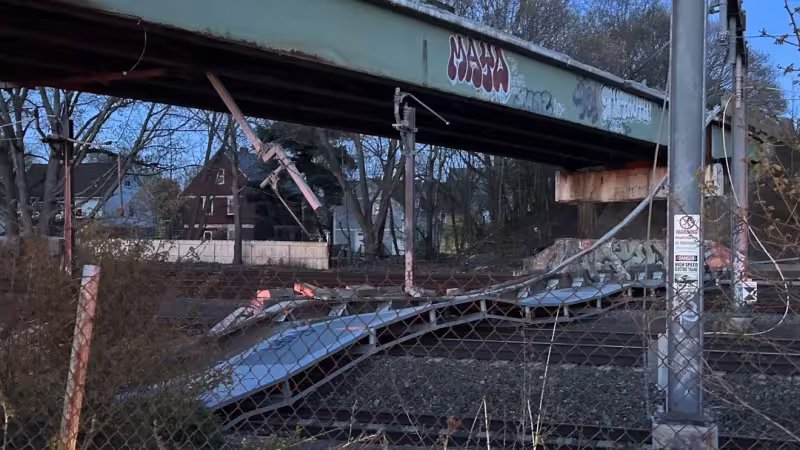 Structural parts fall across train tracks in Cranston; Amtrak stops trains