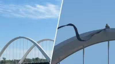 Guido Reichstadter remains atop Frederick Douglass Bridge after Friday climb