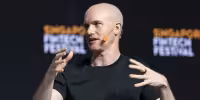 Coinbase to cut 14% of staff as Brian Armstrong cites AI shift